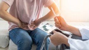 A woman with pancreatic cancer is talking to her doctor about Social Security disability.